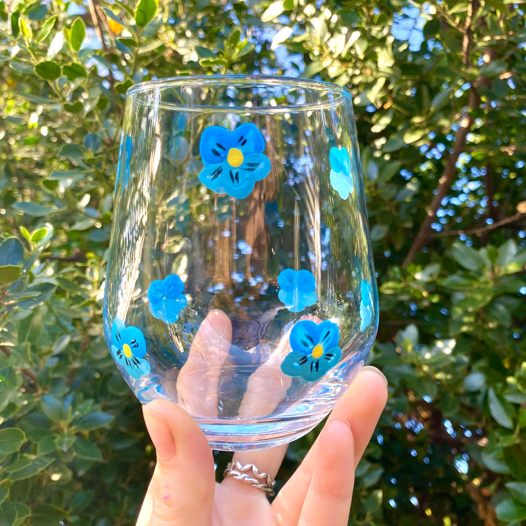Blue pansy stemless wine glass