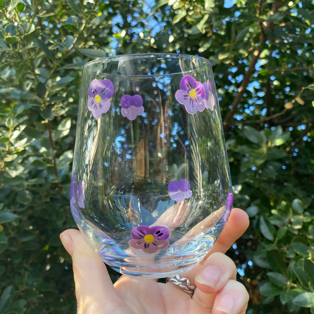Purple pansy stemless wine glass